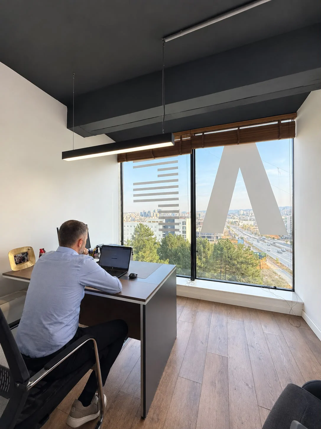 A team member working inside the AFAM office